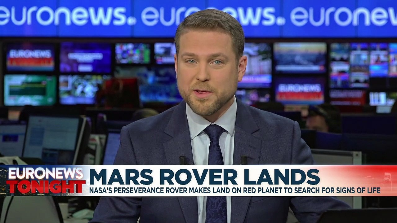 NASA rover returns its first images from Mars after historic landing