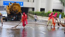 Gurgaon floods over! Manual sweeping and water diversion at Gurugram Highway after heavy rains