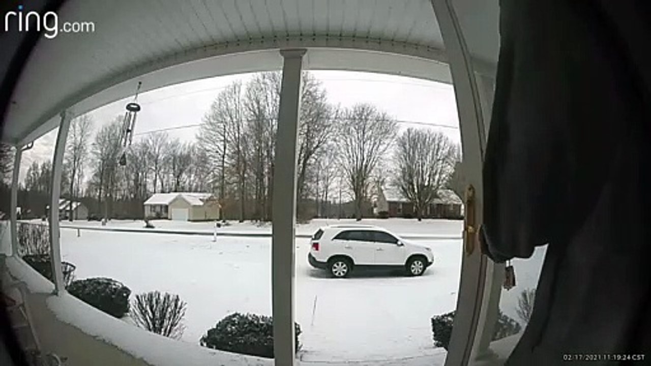 Man Slips Down Icy Front Porch Steps