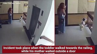 On cam - Mom saves toddler from falling off building stairwell
