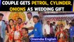 #PriceHike: Guests gift Petrol, Gas Cylinder and Onions to newly-wed: Watch | Oneindia News