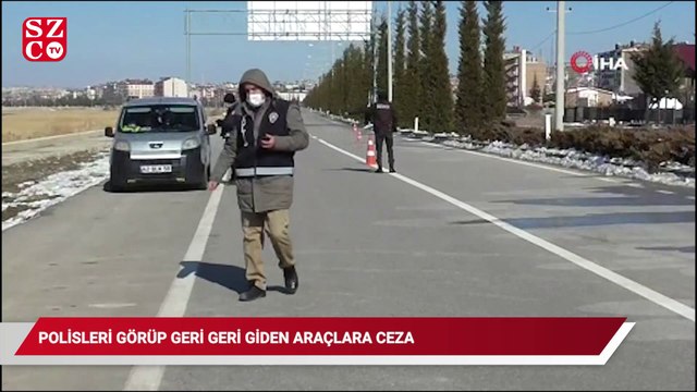 Uygulama yapan polisleri görüp geri geri giden araçlara ceza