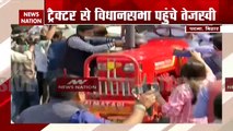 Tejashwi Yadav rides tractor in support of farmers' protest