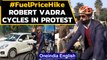 Robert Vadra attacks PM Modi over rising fuel prices, cycles to office | Oneindia News