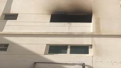 وفاة 5 أشخاص وإصابة 16 اختناقا في احتراق بناية بالشارقة