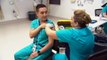 COVID ward nurse first to receive COVID-19 vaccine in Queensland