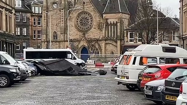 Roof blown from from building - Emergency services on Iona St in Leith