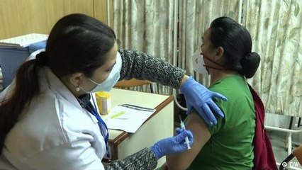 Two sides of coronavirus vaccination
