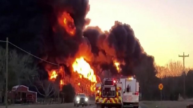 Truck collides with train, causing large explosion