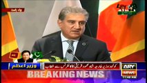 Foreign Minister Shah Mehmood Qureshi addresses a conference in Colombo
