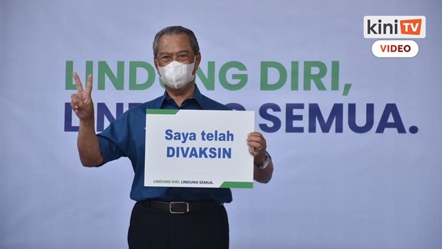 Muhyiddin becomes first person to receive Covid-19 vaccine in Malaysia