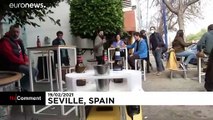 Robots used to pour and deliver beers in Seville bars during pandemic