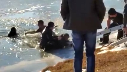 Man and woman rescued from icy pond