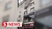 Woman and neighbours save four children in Istanbul fire