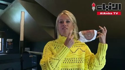 شركة بلجيكية تبتكر كمامات تعيد الابتسامة إلى وجوه واضعيها