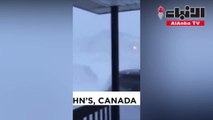 عاصفة ثلجية تغطى المنازل والسيارات بكندا