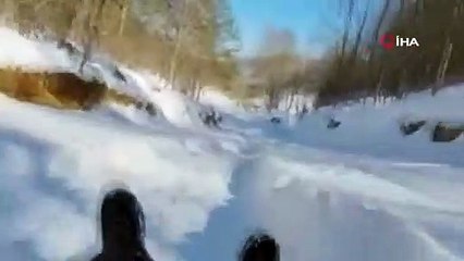 Köyde snowboard keyfi kamerada
