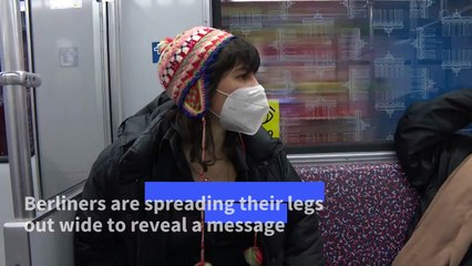 Berlin activists show manspreaders who wears the trousers