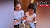 وزيرة مصرية تصنع كعك العيد مع حفيدتها