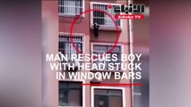 رجل شجاع ينقذ طفلا حشر رأسه بنافذة