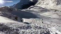 شاهد متزلج يوثق لحظة إنهيار ثلجي في جبال الألب