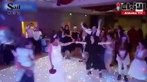 شاب يدفع فتاة أرضا في حفل زفاف بسبب باقة زهور عروس