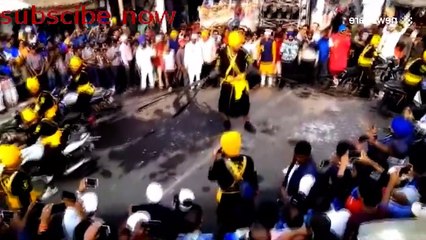 7 foot 6 Indian cop holds back six motorcycles with only his hands