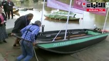 نشطاء بيئة بريطانيون يصنعون قاربا من النفايات يحمل 12 راكبا