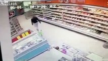 Supermarket floor COLLAPSES seconds after customers walk through in dramatic CCTV