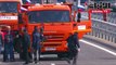 بوتين يقود أول شاحنة تعبر على جسر يربط بلاده بالقرم