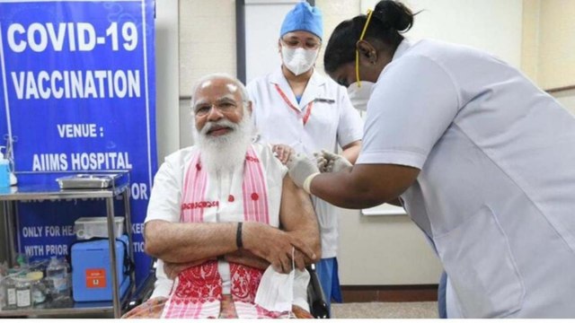 AIIMS director speaks about PM Modi getting corona vaccine