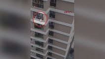 Vietnam'da 12'nci kattan düşen küçük kızı kurye kurtardı