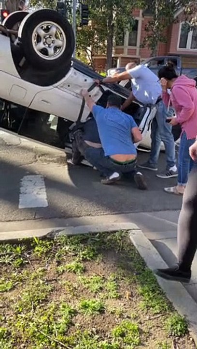 Woman Rescued from Roll Over