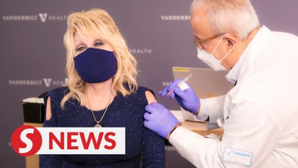 Dolly Parton gets first dose of Covid-19 vaccine she helped fund