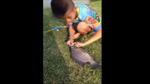 Boy Catches Fish...With A Toy Fishing Pole