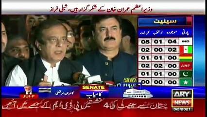 Information Minister Shibli Faraz talks to media