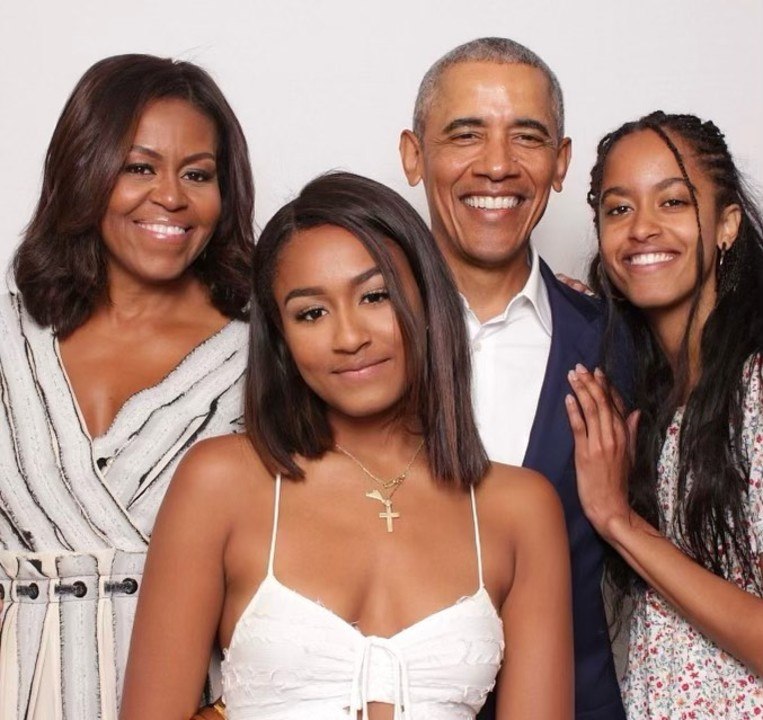 Michelle Obama Says She and Barack Can't Get a Word in with Sasha and Malia