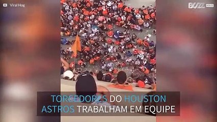 Torcedores do Houston Astros se reúnem para devolver chapéu a mulher