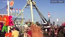 Homem finge controlar parque de diversões com a mão em vídeo criativo