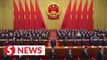 China's parliament looks to Hong Kong, defence spending