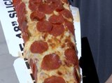 LIFE-SIZE PIZZA! Dodgers and White Sox selling 18-inch pizza slice at Spring Training - ABC15 Digital