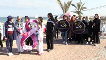 Gazze'de kadınlar Dünya Kadınlar Günü'nde 'Kendinden Emin Adımlar' sloganıyla yürüdü