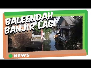 Banjir yang menggenang menyebabkan sejumlah jalan terputus