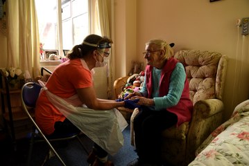 Julie Hodgkinson visits her mum Lillian inside her care home for the first time in a year