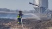 Indiana firefighters battle wind-fueled grass fire
