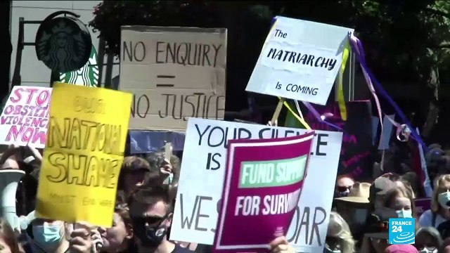 Black-clad women rally in Australia to demand gender violence justice