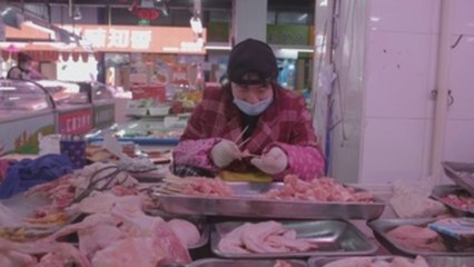 La inflación en China se contrajo en febrero aunque menos de lo esperado