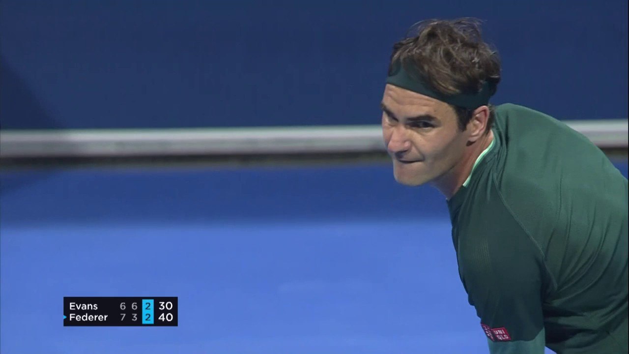 Federer beats Evans in epic return