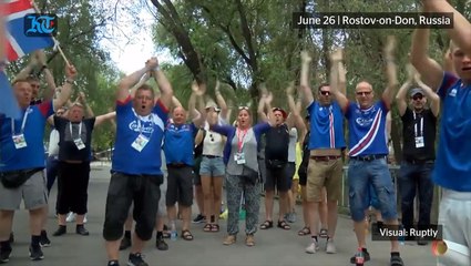 Iceland fans stroll through Rostov-on-Don singing songs and waving flags