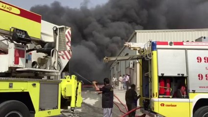Firemen trying to contain the blaze at a warehouse in Ras Al Khor, ‎Dubai